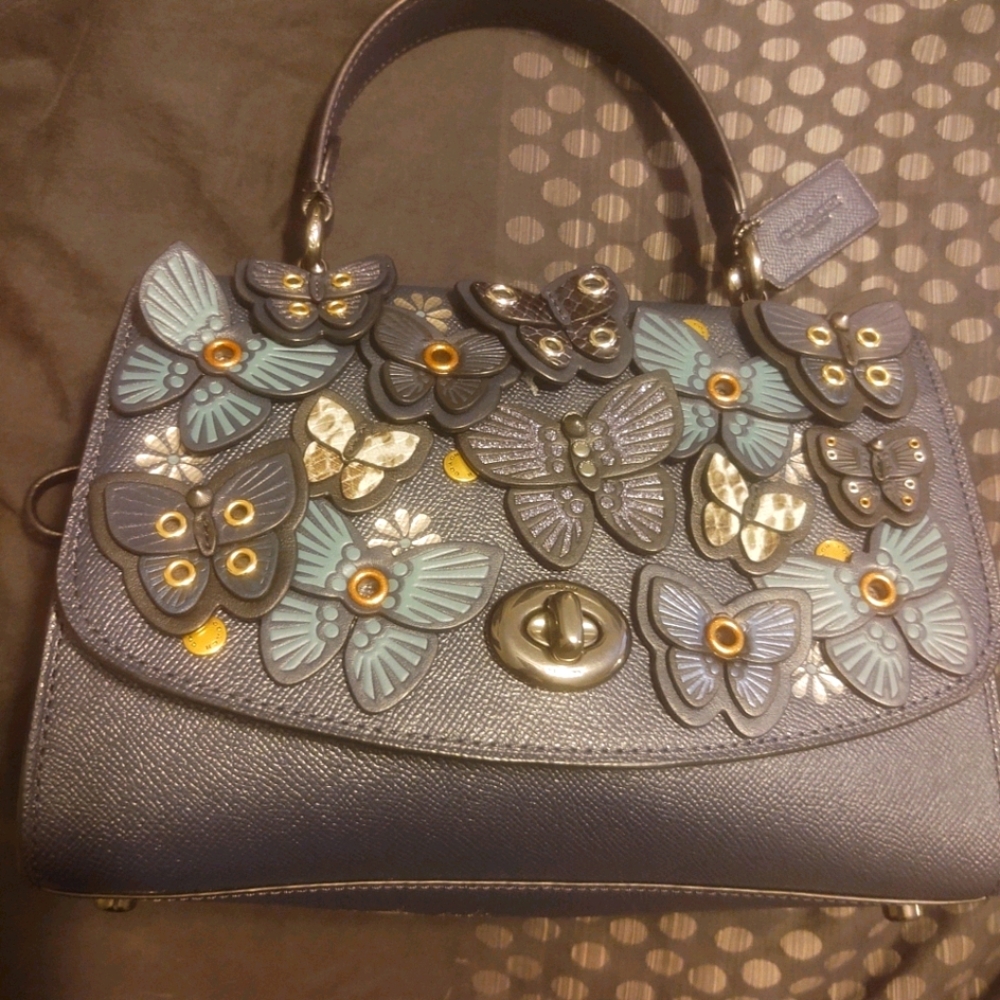 Coach blue butterfly
